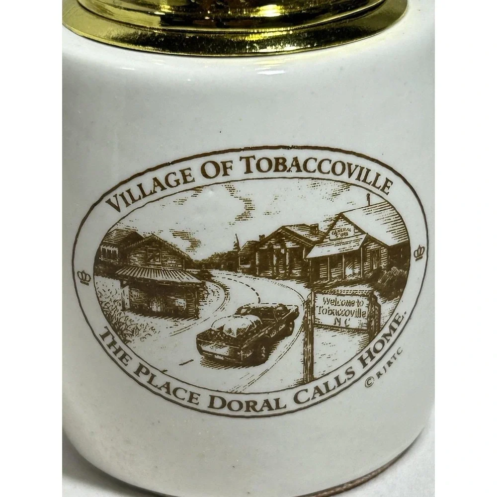 Lot of 2 Vintage Village of Tobaccoville NC North Carolina Doral Lighter NOS